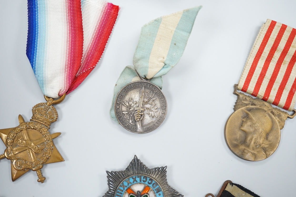A quantity of assorted medals, an Essex crystal button, badges and ephemera